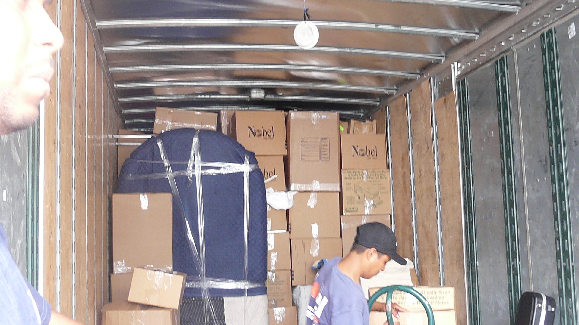 Nobel Relocation team professionally loading a moving truck